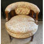 An Edwardian inlaid tub chair on castors. To back 64cm, to seat 38cm, 60cm w.