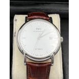 A boxed gentleman's stainless steel IWC Schaffhausen Portofino automatic wristwatch, the white