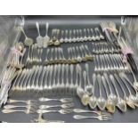 An extensive suite of German silver cutlery. Marked with German marks and Posen .800. Initialled