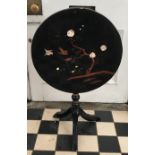 A lacquered chinoiserie decorated, circular tip top pedestal table. 54 d x 64cm h.