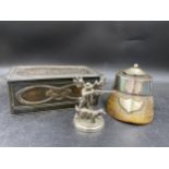 A white metal horses hoof inkwell with engraved shield "Liris, Cambridgeshire 1876" and an
