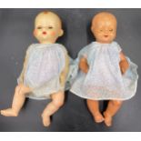 Two English vintage dolls, one marked Pedigree in hard plastic with moulded hair, approx. 46cm l the