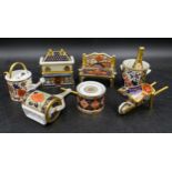 A group of Royal Crown Derby porcelain miniature items, comprising toy drum with drumsticks,