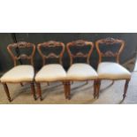 Four Victorian balloon back dining chairs. 84cm h to back, 44cm to seat.