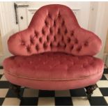 A 19thC buttoned upholstered nursing chair on ceramic castors, possibly Gillows. 77 h x 88cm w. Ht