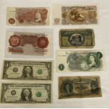 Two ten shilling notes, a one pound note, two U.S. one dollar bills, a 1951 Bulgarian 50 Leva