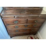 A 19thC oak chest of 2 short over 3 long drawers on bracket feet brass handles with brushing slide