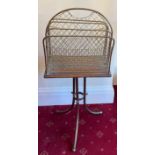 Edwardian oak and and brass revolving magazine rack 83cm h x 37cm w.