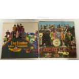 Beatles interest. Two album covers, 'The Beatles Yellow Submarine' and 'Sgt Pepper's Lonely Heats