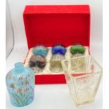 Boxed set of six coloured glasses with silver overlay decoration, a Nailsea glass vase with