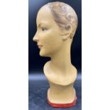 A vintage painted haberdashery or shop display female head/bust, 47cm h