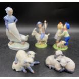 A collection of Royal Copenhagen Denmark to include a pair of resting lambs no.2769, lambs playing