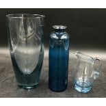 Three pieces of Whitefriars glass to include a Geoffrey Baxter blue vase 24.5cm h, cream jug and a