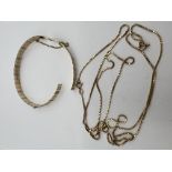 Two yellow metal chains marked 10k plus a 9ct gold tri-colour bangle a/f. Total weight 16.7gm.