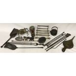 A collection of brass and copper to include mainly fireplace wares: fire irons, tongs, shovels and