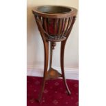 Edwardian mahogany and inlaid jardiniere with brass liner. 95cm h.