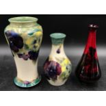 A Charles Noakes Royal Doulton Flambe rose vase along with two Moorcroft vases tallest 19cm h.