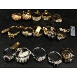 A collection of costume rings to include some 22ct plated and Swarovski, various sizes.