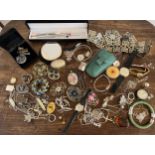 A quantity of vintage costume jewellery to include a continental silver cased pocket watch, hatpins,