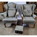 Two blue wingback chairs and footstool. Height to seat 44cm h.