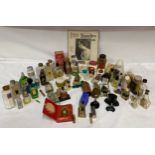 A large collection of cosmetics to include "Maderas de Orienie" perfume, "Mischief" in the shape