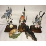 A collection of Franklin Mint "Big Cats of the World" figures including Cheetah and Black Panther