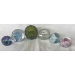 A selection of six paper weights to include one Maltese and five Caithness, various colours, sizes