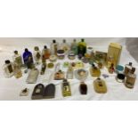 A collection of perfume bottles to include Chatelet with glass stopper, Pomeroy day cream jar with a