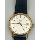 An Omega gentleman's automatic silver faced wristwatch with leather strap. case diameter measures