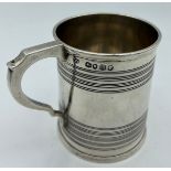 A Victorian silver mug, London 1867, maker William Evans. Weight 156gm, height 8cm.