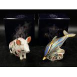 Two Royal Crown Derby boxed paperweights: Sitting Pig with red factory stamp, gold stopper, date