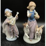 A pair of Lladro figurines to include Out for a Romp 5761 and Mandolin Serenade 5696.