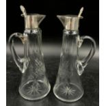 A matching pair of cut glass silver topped whiskey noggins marked 925 under lid 18cm h.