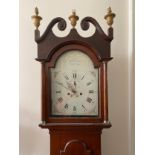 A 8 day long case oak clock by Thomas Beverly Caistor with painted ceramic face, seconds dial and