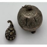 Indian white metal lidded bowl 11cm h together with a white metal snuff bottle.