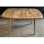 A mid century Ercol elm occasional table. 73 x 45 x 45cm h.