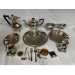 A quantity of silver plate including 2 x galleried trays, a raised salver, a tea and coffee set by