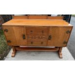 An Art Deco Golden Oak sideboard, table and chairs by TT Cass & Sons, Hull. Sideboard 153 w x 52 d x