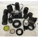 A camera bag and accessories to include an Asahi Pentax SP Spotmatic camera, a mirror lens 500mm,