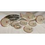 A Crown Devon fish set comprising a large platter 50cm, 4 x plates 23cm and a sauce dish on stand,