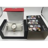 A boxed Tissot 1853 Gentleman's Bracelet Watch, in original box and outer case. Case diameter 35mm.