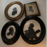 Four framed 19thC oval portrait silhouettes. Largest 17.5 x 15cm.