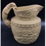 An early 19thC relief moulded J.G. Bagster hunting stoneware jug with hound handle 19cm h.