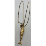 Nine carat gold reticulated fish on 9 carat gold chain. Total weight 6gm. Chain 60cm long. Fish