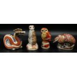 Royal Crown Derby comprising 3 paperweights with gold stoppers: Armadillo, Meercat and Dragon