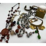 A quantity of vintage jewellery etc to include African necklaces, bangles, stone beads including