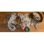 A quantity of costume jewellery to include earrings, .800 filigree silver bracelet, rings, necklaces