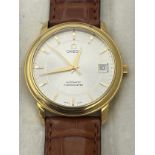 A boxed gentleman's 18ct gold omega automatic chronometer wristwatch. marked 750 to back, silver