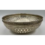 A German silver bowl with pierced decoration. Weight 245gm, size 20cm d.