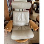 A cream leather stressless chair.